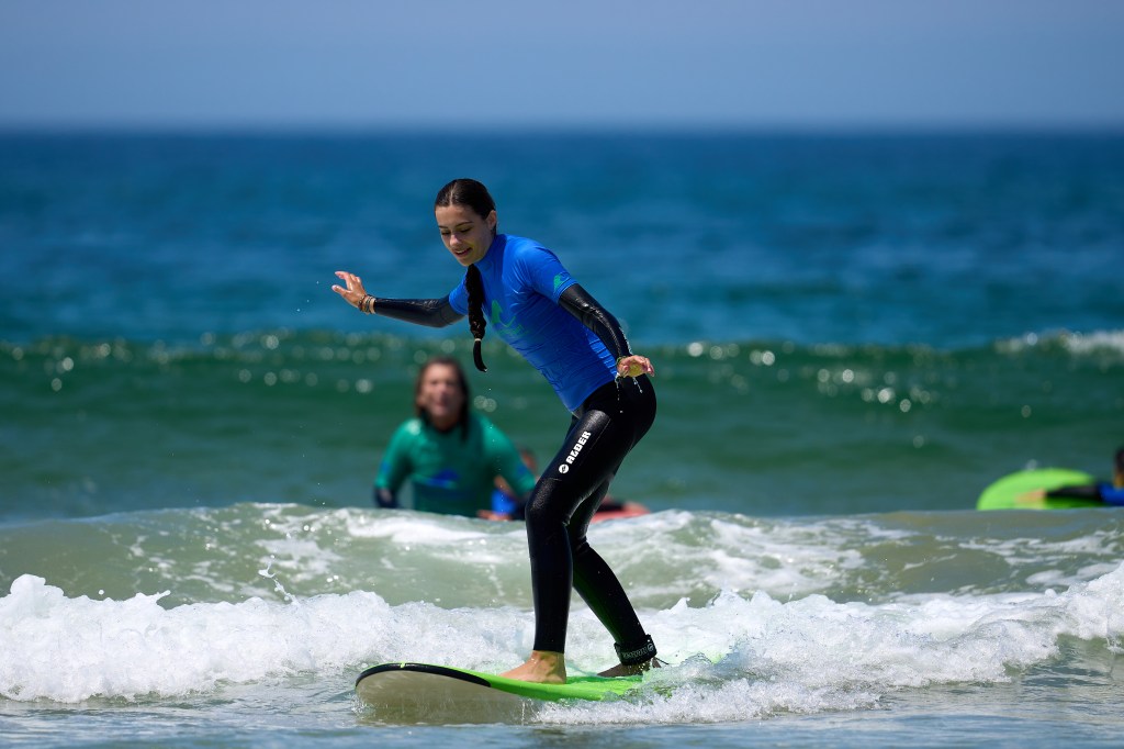 Beginner surf lesson at Nova Praia, Costa da Caparica, Portugal
