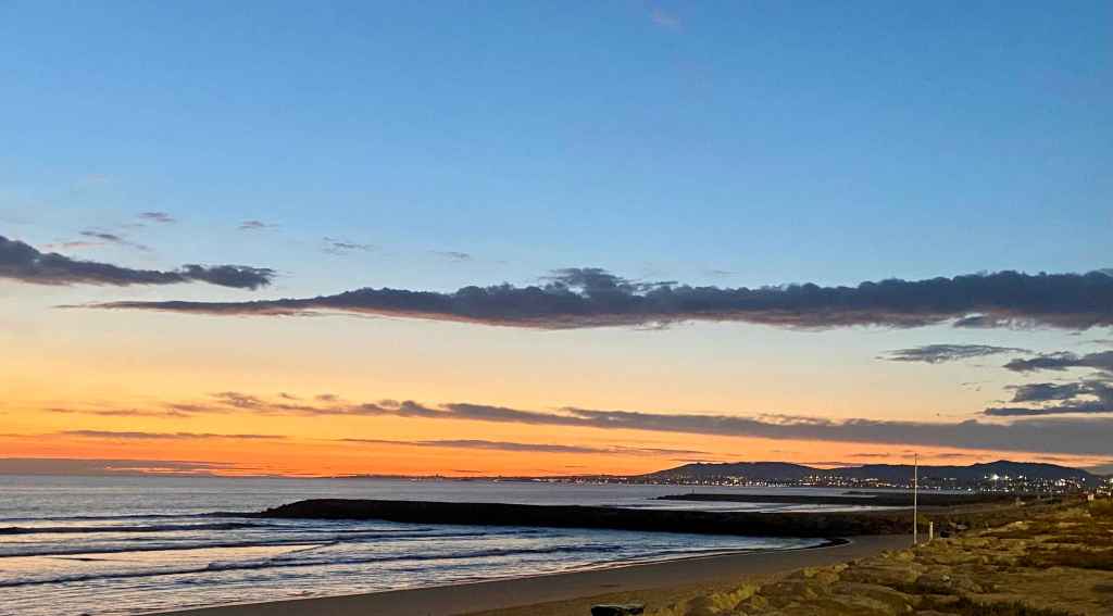 Sunsets in Nova Praia beach, Costa da Caparica, are amazing and watching them after a surf lesson is a must